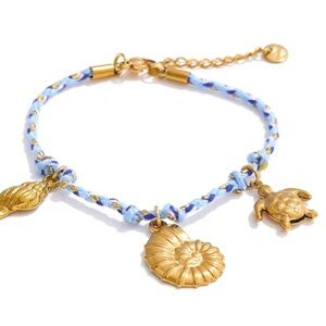 Shell, starfish, seahorse Charm Bracelet with Blue Cord